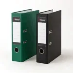 Green and black lever arch files standing upright